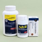 West Palm Beach, USA - May 16, 2014: Advil and two gereric brands of ibuprofen. Ibuprofen is a nonsteroidal anti-inflammatory drug (NSAID), used to relieve mild pain and fever. Advil is manufactured by Pfizer and has been on the market since 1984. The generic brands are distributed by Target and Publix Supermarkets.